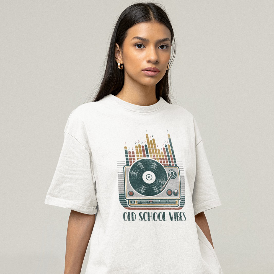 A vibrant, distressed graphic featuring a large turntable with a vinyl record spinning, its tone arm positioned over the record. Behind the turntable, vertical equalizer bars in shades of brown, orange, yellow, and red rise upwards, with small music notes floating above them. Bold, distressed text reads "OLD SCHOOL VIBES". The design evokes retro music and DJ culture.
