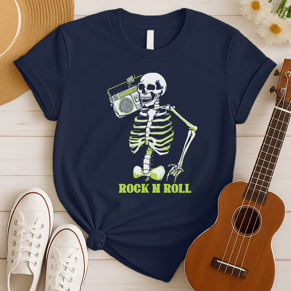 A striking graphic design features a full skeleton, rendered in white with a vibrant lime green glow on its bones, posed in a dynamic, walking stance. The skeleton holds a detailed, white outline of a retro boombox over its right shoulder. Below the skeleton, the bold, lime green text "ROCK N ROLL" is prominently displayed, creating a cool, energetic, and slightly spooky tribute to classic music.