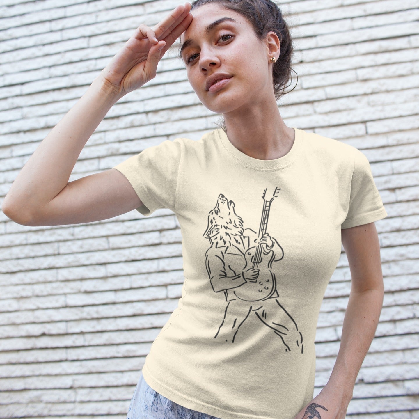 A minimalist line art graphic depicts a howling werewolf, outlined in light grey, powerfully playing an electric guitar. The werewolf is shown from the waist up, wearing a jacket, with its head thrown back in a howl and its hands gripping the guitar. The entire design captures the raw energy of rock music and a primal connection to the wild.