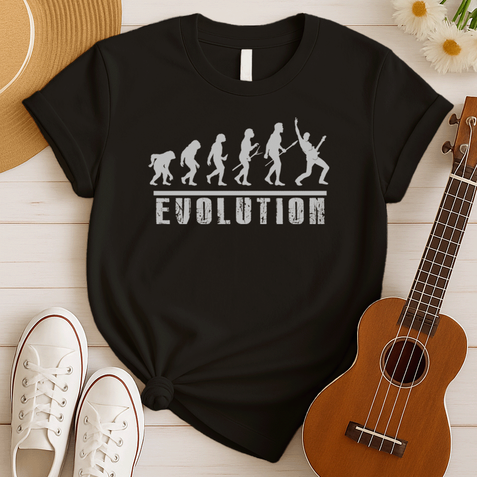 A striking graphic design illustrates the "Evolution of Man" in a sequence of white silhouettes against a black background, beginning with an ape-like figure and progressing through various stages of hominid development. The final figure in the evolutionary chain is a modern human, dynamically playing an electric guitar and raising a "rock on" hand gesture, symbolizing the evolution into a "rockstar." Below the figures, the bold, distressed white word "EVOLUTION" is prominently displayed.
