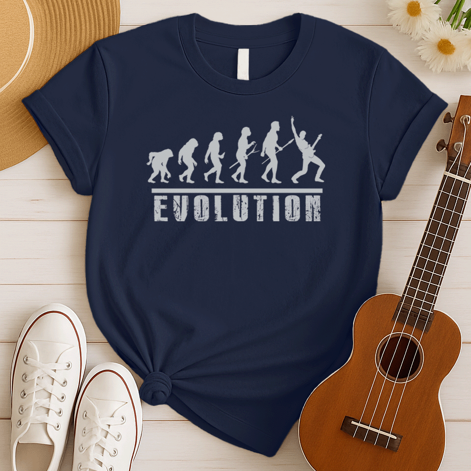 A striking graphic design illustrates the "Evolution of Man" in a sequence of white silhouettes against a black background, beginning with an ape-like figure and progressing through various stages of hominid development. The final figure in the evolutionary chain is a modern human, dynamically playing an electric guitar and raising a "rock on" hand gesture, symbolizing the evolution into a "rockstar." Below the figures, the bold, distressed white word "EVOLUTION" is prominently displayed.