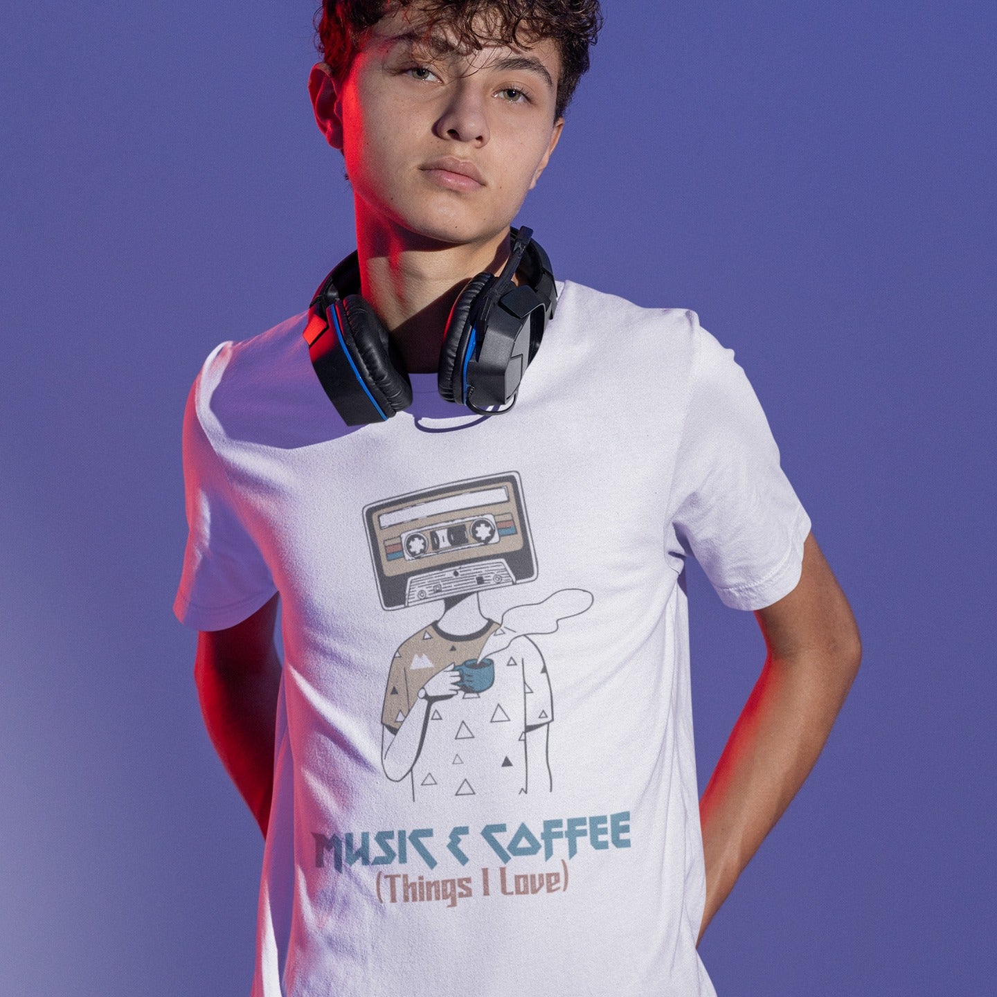 Stylized graphic of a person's body with a vintage brown and black audio cassette tape as its head, holding a blue steaming coffee cup. Small triangle patterns are on the person's beige shirt. Blue distressed text below reads "MUSIC & COFFEE" and red text below that says "(Things I Love)". The design embodies music appreciation, coffee love, and retro nostalgia, ideal for music lovers and coffee enthusiasts.
