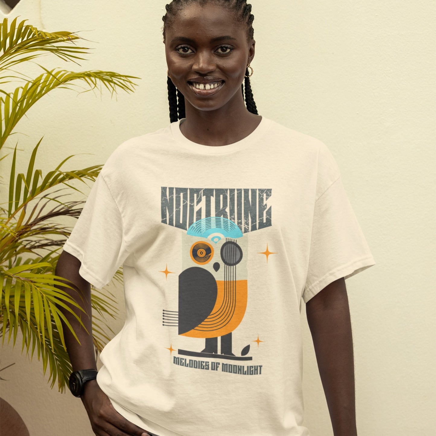 Stylized owl design made from vinyl records and musical instruments, with a blue record forming the head and orange feathers. Features sparkles and the words "NOCTURNE" and "MELODIES OF MOONLIGHT." This music-themed art is ideal for music lovers, retro music fans, and night owl enthusiasts.