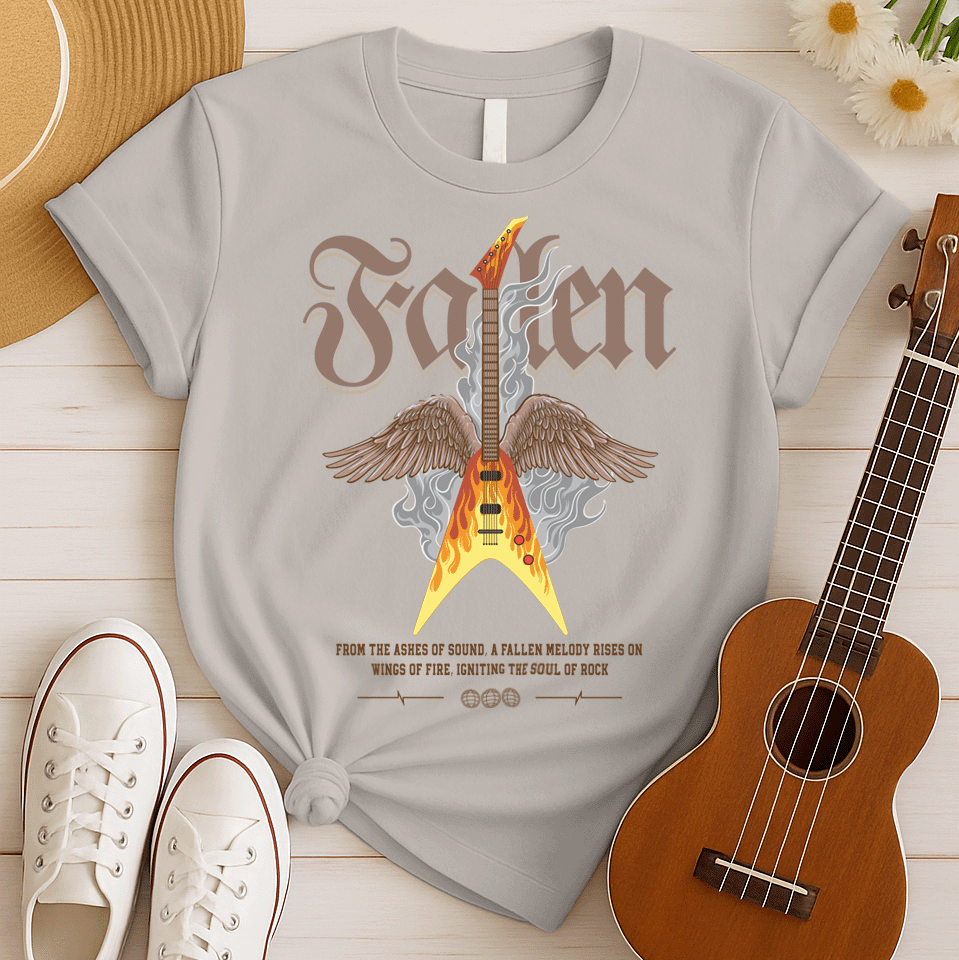 Dramatic graphic featuring a vibrant yellow and orange electric guitar engulfed in flames with large brown feathered wings, rising from grey smoke. The design powerfully symbolizes the resurrection and enduring spirit of rock and metal music, driven by a fiery guitar, ideal for guitar lovers and hard rock fans.