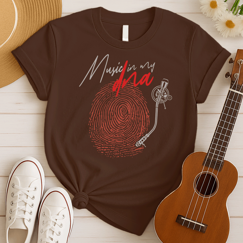 Stylized graphic of a large red fingerprint that is designed like the grooves of a vinyl record, with a white turntable tonearm and needle positioned on it. Above, white handwritten text says "Music in my" and red stylized text says "dna". The design perfectly symbolizes an inherent passion for music, vinyl records, and unique identity, ideal for music lovers and DJs.