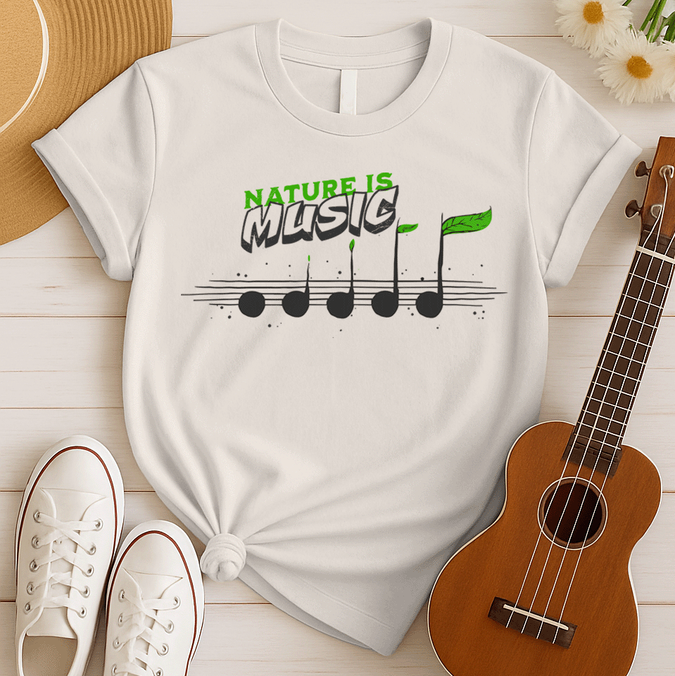 A black background features the text "NATURE IS" in a distressed green font at the top. Below it, the word "MUSIC" is prominently displayed in a larger, distressed dark grey font with a subtle 3D effect. Below the text, a horizontal musical staff is shown with five round, dark grey quarter notes. Each note has a small green leaf growing from its stem, with the last note having a larger, more prominent green leaf. The design symbolizes the connection between nature and music, perfect for environmentalists an