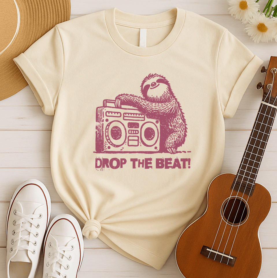 A light grey background features a distressed, red-brown illustration of a fluffy sloth. The sloth is leaning on a large, matching red-brown boombox, which has prominent speakers and controls. Below the sloth and boombox, the distressed text "DROP THE BEAT!" is written in a blocky, red-brown font with a slight splattered effect. The design portrays a relaxed animal enjoying loud music from a retro radio.