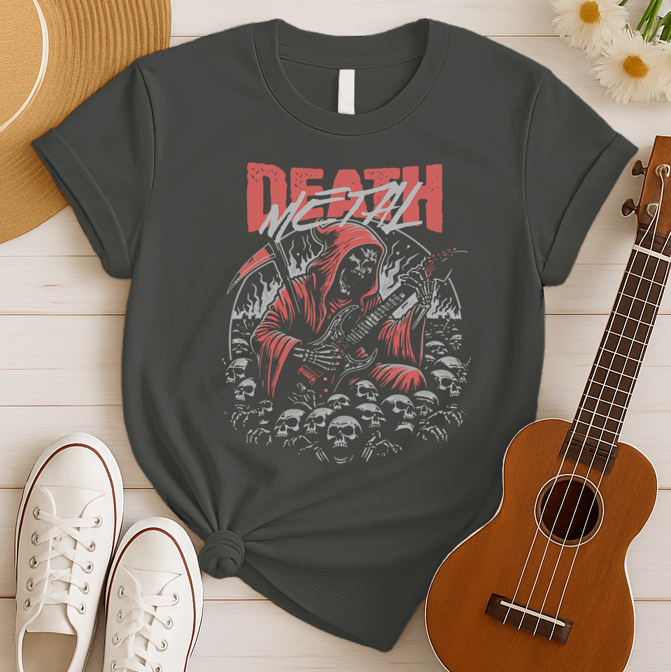A black background features the distressed red text "DEATH" at the top, with "METAL" in distressed light grey below it. The main image is a detailed illustration of a skeletal Grim Reaper figure in a flowing red hooded robe, holding a large scythe in its left hand and aggressively playing a black electric guitar in its right. The figure is surrounded by many light grey human skulls and ghostly white/grey flames or smoke effects. The design embodies death metal music, dark themes, and guitar performance.