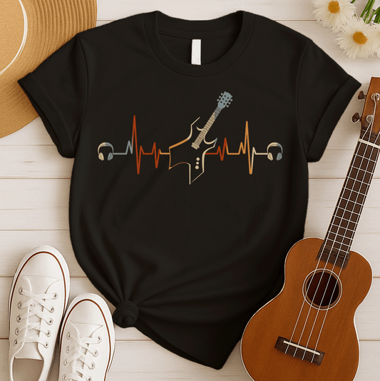 A striking graphic design presents a black electric guitar, notable for its sharp, angular body and a light blue fretboard, positioned centrally within a vibrant, horizontally stretching electrocardiogram (ECG) heartbeat line that shifts from warm reds and oranges to cooler yellows and light blues. A pair of white over-ear headphones are situated at either extremity of the heartbeat line, symbolizing the energetic connection between musical passion and the rhythm of life