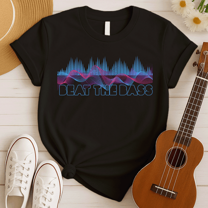 A vibrant graphic design features dynamic pink and blue sound waves undulating across a black background, interspersed with vertical blue equalizer bars that rise and fall. Below these auditory visuals, the phrase "BEAT THE BASS" is rendered in bold, outlined blue text. This energetic composition visually represents powerful bass music and electronic sound.
