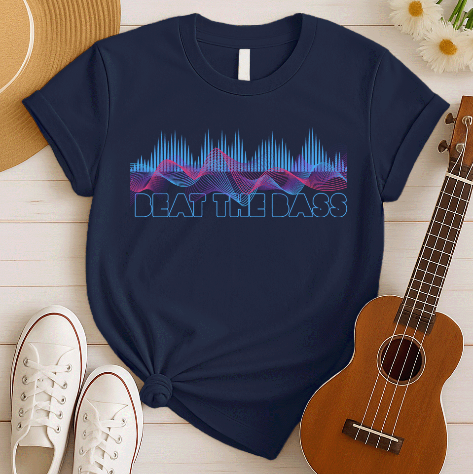 A vibrant graphic design features dynamic pink and blue sound waves undulating across a black background, interspersed with vertical blue equalizer bars that rise and fall. Below these auditory visuals, the phrase "BEAT THE BASS" is rendered in bold, outlined blue text. This energetic composition visually represents powerful bass music and electronic sound.