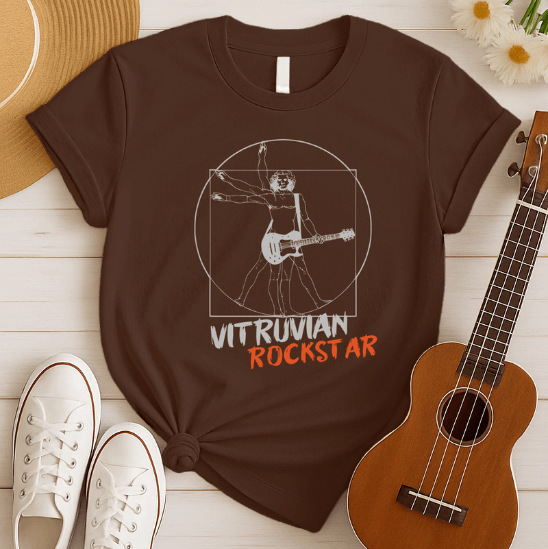 A stylized graphic design, reminiscent of Leonardo da Vinci's Vitruvian Man, depicts a shirtless figure with long hair and multiple arms and legs in various poses within a white circle and square. Instead of open palms, the figure holds an electric guitar across its body, suggesting a musical twist. Below the illustration, the words "VITRUVIAN" in distressed white text and "ROCKSTAR" in distressed orange text are prominently displayed, all set against a solid black background. The design blends classical ar