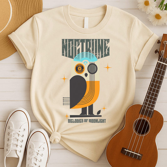 Stylized owl design made from vinyl records and musical instruments, with a blue record forming the head and orange feathers. Features sparkles and the words "NOCTURNE" and "MELODIES OF MOONLIGHT." This music-themed art is ideal for music lovers, retro music fans, and night owl enthusiasts.