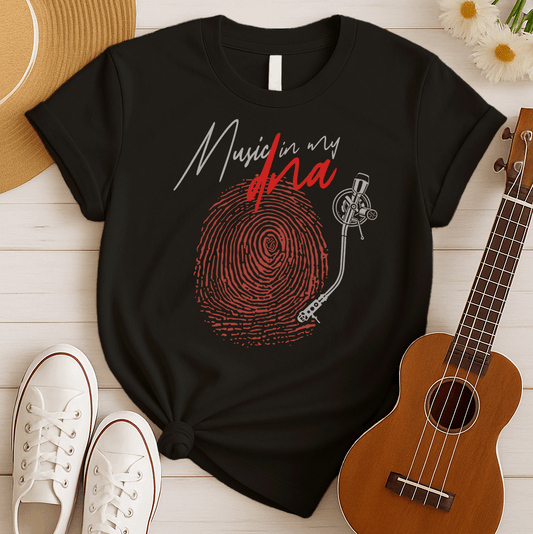 Stylized graphic of a large red fingerprint that is designed like the grooves of a vinyl record, with a white turntable tonearm and needle positioned on it. Above, white handwritten text says "Music in my" and red stylized text says "dna". The design perfectly symbolizes an inherent passion for music, vinyl records, and unique identity, ideal for music lovers and DJs.