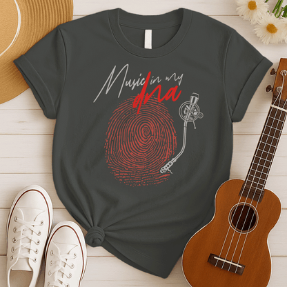 Stylized graphic of a large red fingerprint that is designed like the grooves of a vinyl record, with a white turntable tonearm and needle positioned on it. Above, white handwritten text says "Music in my" and red stylized text says "dna". The design perfectly symbolizes an inherent passion for music, vinyl records, and unique identity, ideal for music lovers and DJs.