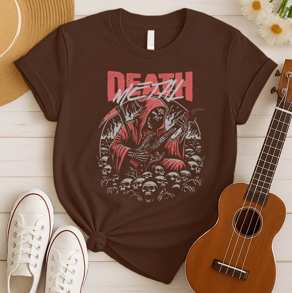 A black background features the distressed red text "DEATH" at the top, with "METAL" in distressed light grey below it. The main image is a detailed illustration of a skeletal Grim Reaper figure in a flowing red hooded robe, holding a large scythe in its left hand and aggressively playing a black electric guitar in its right. The figure is surrounded by many light grey human skulls and ghostly white/grey flames or smoke effects. The design embodies death metal music, dark themes, and guitar performance.